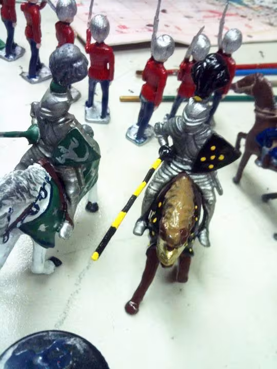 Knights cast in lead, painted in enamels.