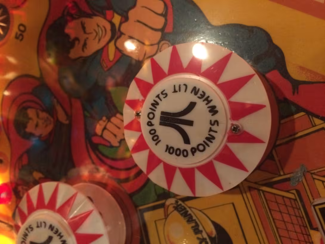 Pinball: 100 points, 1000 points when lit--bumper with an Atari logo on top of it.